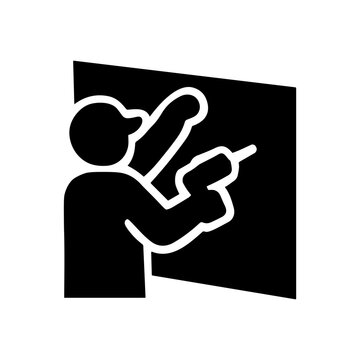 Drywall installation worker solid black icon vector illustration