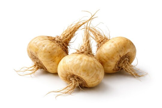 Isolated trio of maca roots on a crisp white studio background