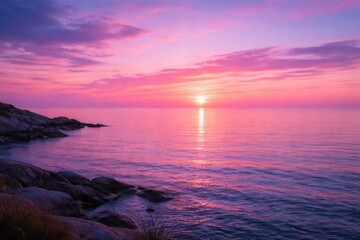 Naklejka premium Tranquil sea landscape at dusk with a glowing pink and purple horizon