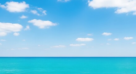 Fototapeta premium A wide panoramic view of a calm turquoise sea under a clear blue sky filled with soft white cumulus clouds on a bright and sunny afternoon, serene, seascape, coastal