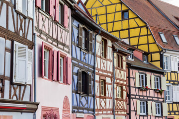 Obraz premium Vibrant colors of half timbered houses in Little Venice in Colmar, France