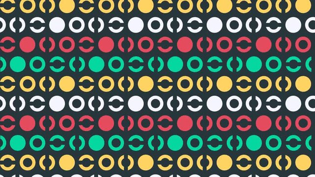 Video of abstract seamless pattern with full and cut circle shapes on dark background. Red, yellow, white, green geometric shapes on black background. Wallpaper for any content, loops continuously.