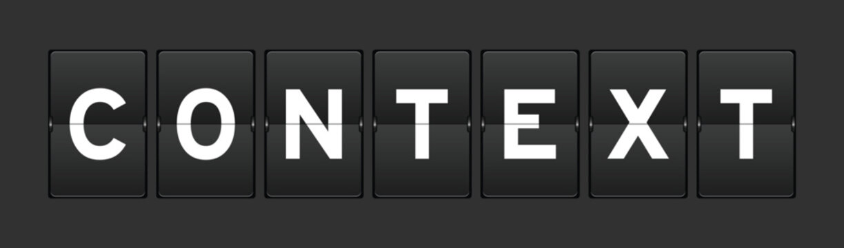 Black color analog flip board with word context on gray background