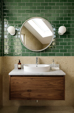 Modern Bathroom with Green Tiles and Wooden Vanity
