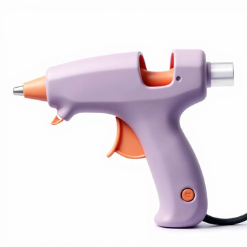 Purple electric glue gun with orange trigger isolated on white background for craft work.