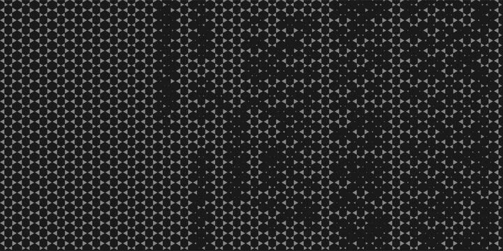 Modern abstract black background featuring a seamless geometric triangle grid pattern with subtle gradient shading.