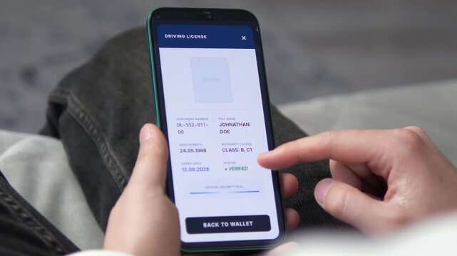 Professional footage of a citizen using a digital ID app on a smartphone. Features verification of a national ID and driver's license. Perfect for e-government, security, and digital transformation