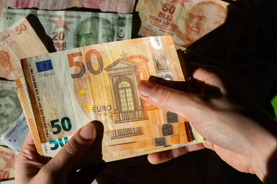 Euro, currency of European Union and Turkish Lira Financial background.