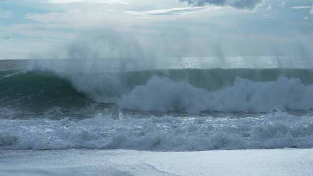 beach in winter landscape with clouds