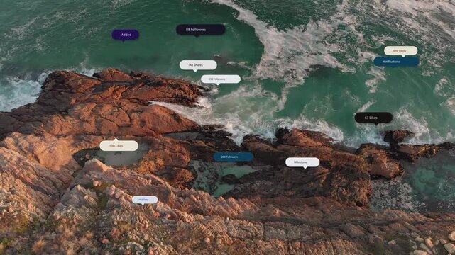 Badges appearing above rocky coast and tide pools on drone sweep drifting to sea showing metrics