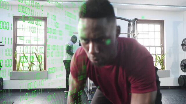 Maroon-shirt lifter doing rows, gripping weight for fitness, green binary overlay showing back