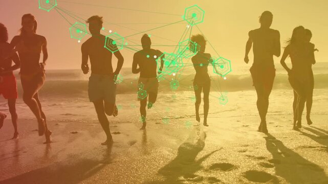 Fitness group starting from shore, running toward camera while green hex network anchoring runners