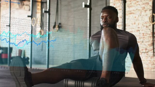 Man placing foam roller under right quad, rolling quad for fitness, data charts growing over legs