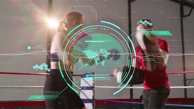 Woman boxer planting feet, throwing jabs, kicks while coach shifting pads HUD guiding training