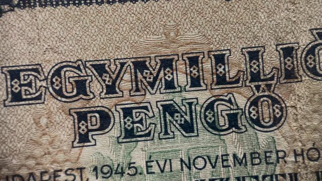 Macro Video of Front Side Hungarian One Million Pengo Banknote 1945. The footage highlights engraved details, texture, typography, and the visual character of a collectible historical currency item.