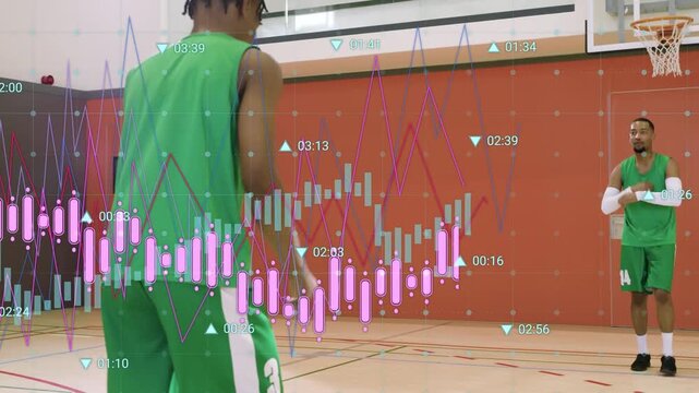 Male passer passing to player in gym pass catching, practicing shooting finance charts over players