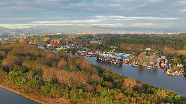 Aerial panning Haverbeck Islet hybrid cruise ship river landscape southern Chile Magellan Discoverer