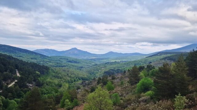 Panoramic view of candelario mountains from a high viewpoint on a cloudy day in salamanca, spain