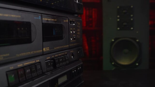 Inserting Audio Cassette Tape and Pressing Play Button on Double Deck Recorder Player, Close Up