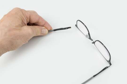 Broken temple and hinge on a male multifocal glasses