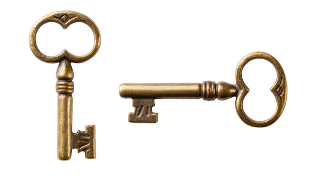 Antique ornate brass keys with decorative handles and aged texture