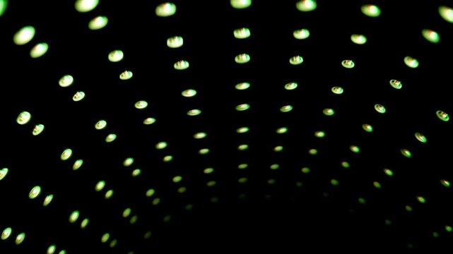 A seamless loop of glowing blue led lights reflecting in an infinity mirror tunnel.
