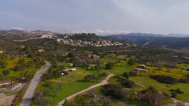 Aerial Drone Perspective of Alassa Village and Mediterranean Hills in Cyprus