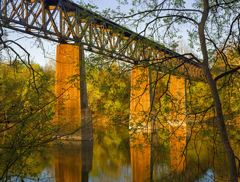 Old Railroad track suspended by stone pillars over the Potomac River along the C&O Canal in Sharpsburg, MD, USA