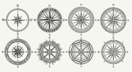 Set of six vintage style compass roses with various detailed designs, isolated white background © REZA
