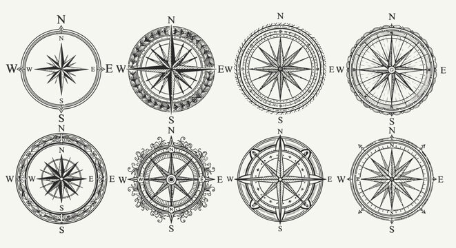 Set of six vintage style compass roses with various detailed designs, isolated white background