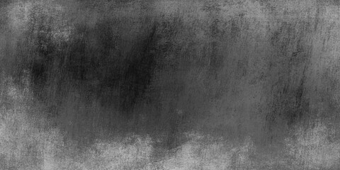 Fototapeta premium A dark black and white grunge background featuring an old textured concrete wall with a dirty vintage paper pattern on a rough gray surface