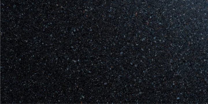 Black asphalt road texture background with rough dark grey stone surface pattern and detailed closeup tarmac material for abstract street wallpaper and construction surface design