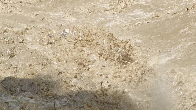 Rio Quijos, Ecuador in flood, A tributary of the Amazon on the eastern slope of the Andes in Ecuador in flood after a tropical storm, slow motion