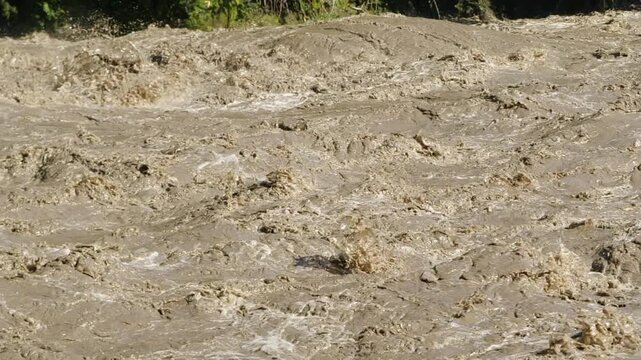 Rio Quijos, Ecuador in flood, A tributary of the Amazon on the eastern slope of the Andes in Ecuador in flood after a tropical storm, slow motion