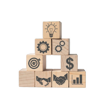 Wooden blocks with business icons form a pyramid