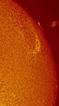 Close-up view of a powerful solar flare erupting from the surface of the sun, showing detailed plasma activity and granulation on the stellar limb in deep space