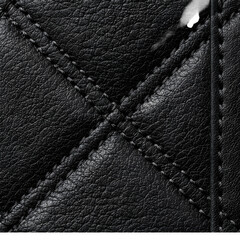 Fototapeta premium Macro Photography of Premium Quilted Black Leather Texture with Detailed Stitching Pattern