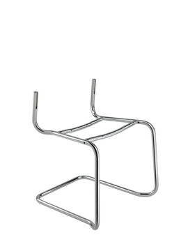 Still life of the iron structure of a chair, on a neutral background