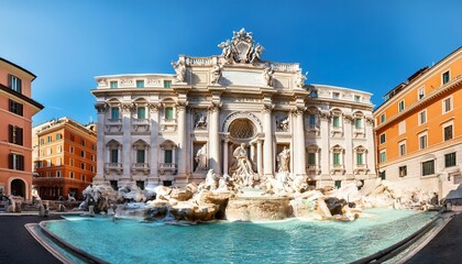 Fototapeta premium stunning view of the trevi fountain in rome italy featuring magnificent baroque architecture and clear blue skies