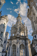 Obraz premium The Chateau de Chambord, in the Centre-Val de Loire region, is one of the most recognizable châteaus in the world due to its French Renaissance architecture.