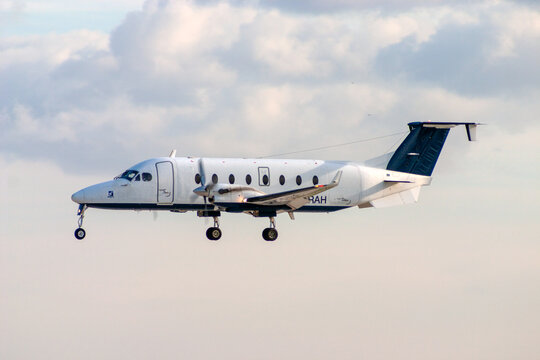 Luqa, Malta - December 30, 2005: Orange Aircraft Leasing  Beechcraft 1900D (REG: PH-RAH) on finals runway 32.