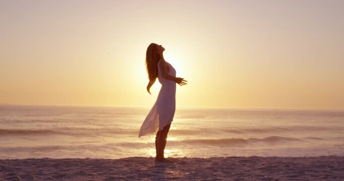 Waves, sunset and freedom with woman at beach for summer vacation, tropical island and travel. Holiday getaway, weekend break and peace with person outdoor for wellness, ocean and paradise space