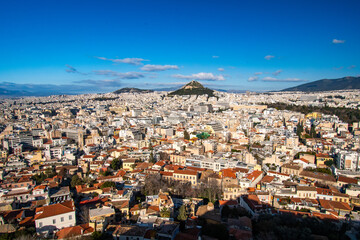 Fototapeta premium Cityscape view of Athens, Greece as seen from the top of the Acropolis of Athens site.