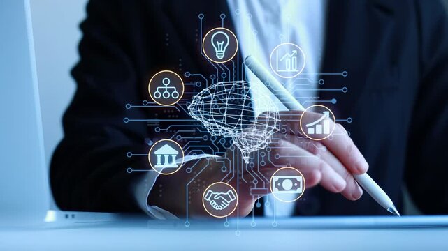Business professional holding a pen and interacting with technology icons on a screen in an office setting during daytime.