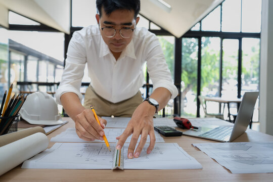 Designing innovative architecture plans office space technical drawing urban environment close-up view creative process