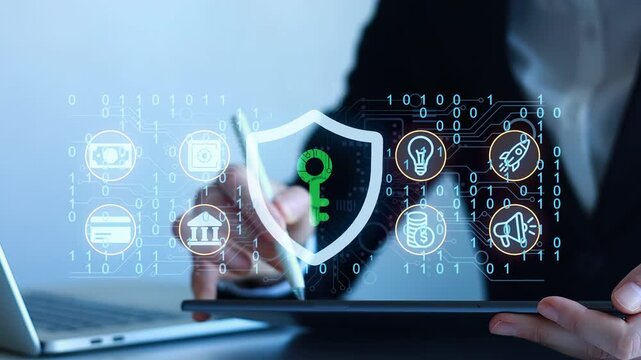 Digital security concept shows a person working on a tablet with graphics related to data protection and technology in an office setting.
