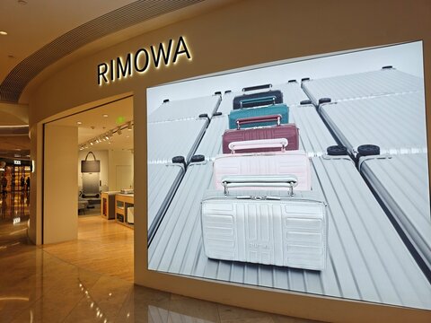 Shanghai,China-Nov.17th 2025: Rimowa retail store entrance with a large lightbox advertisement