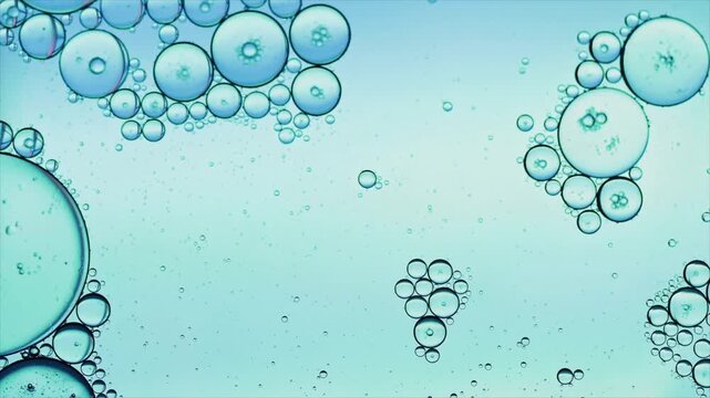 Watercolor bubbles floating on light blue abstract background with hand-drawn numbers and symbols