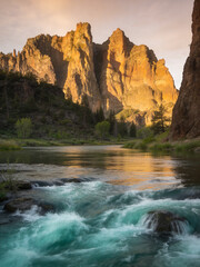 Naklejka premium Majestic Granite Peaks and Rushing River Surge