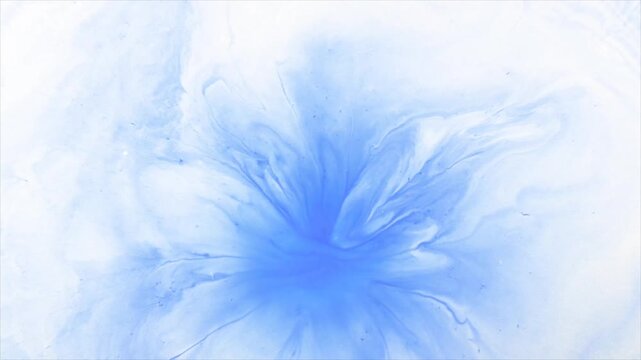 Abstract blue ink swirl and splash in water with soft particle effect